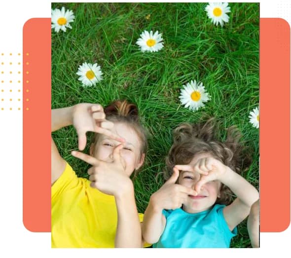 A person flourishing among daisies