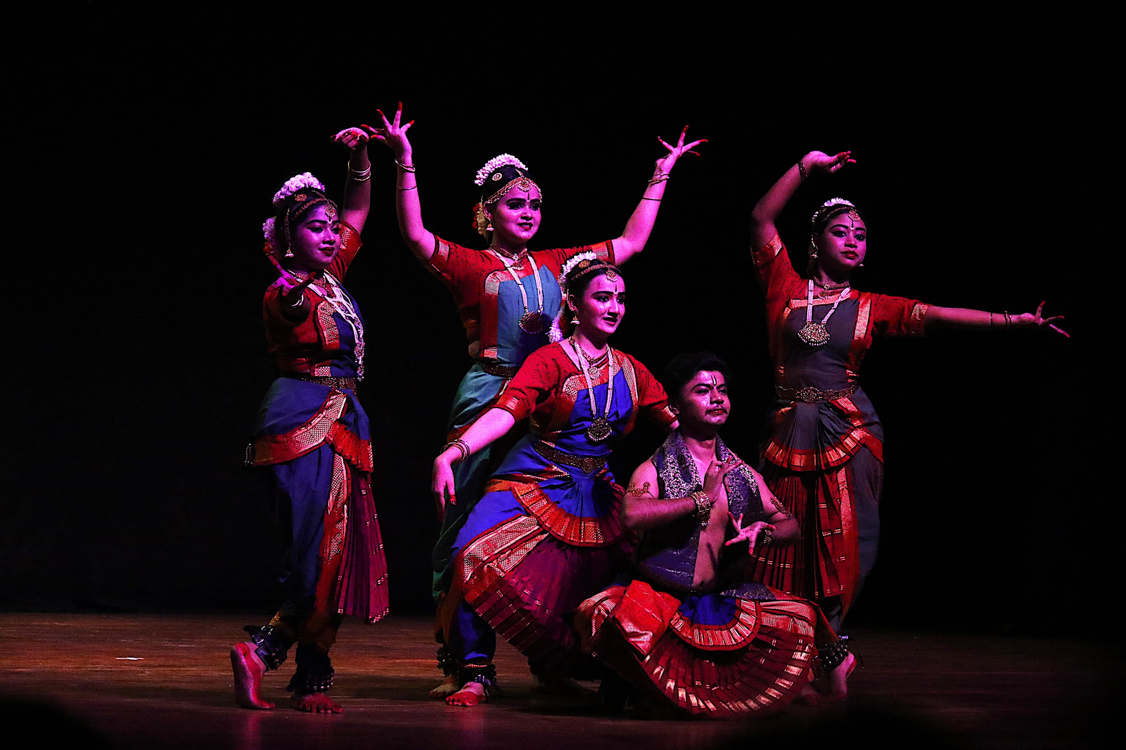 Bharatanatyam dancers performing together at Kamani Auditorium in New Delhi