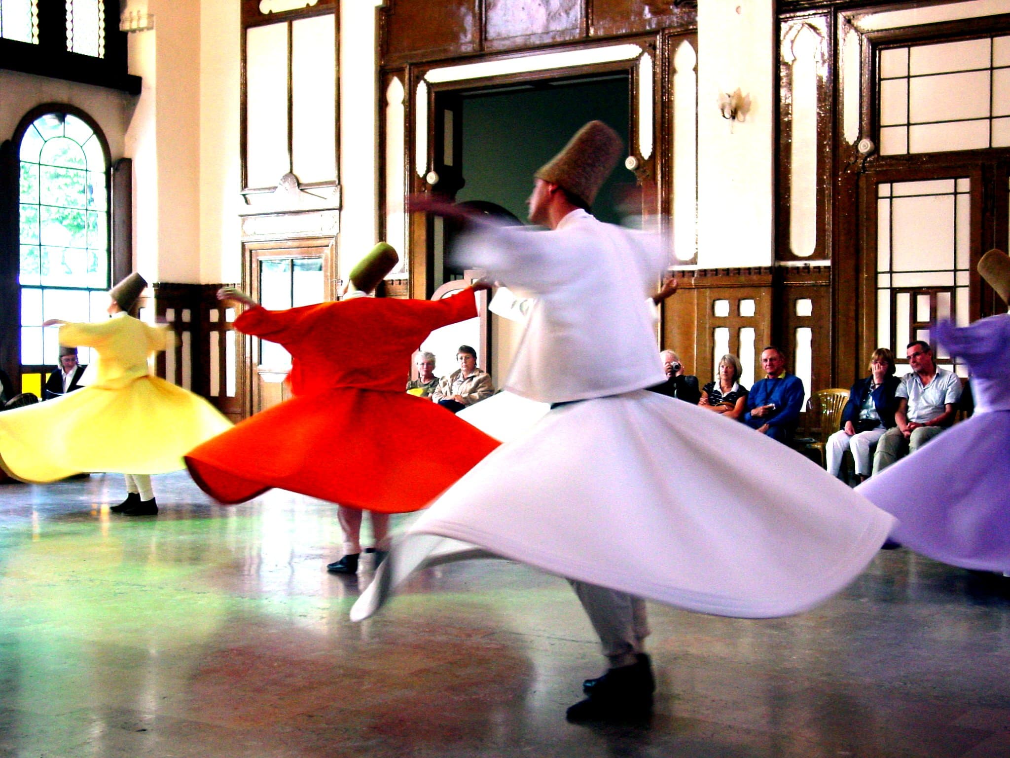 Whirling dervishes performing a Sema ceremony at Sirkeci Railway Station in Istanbul