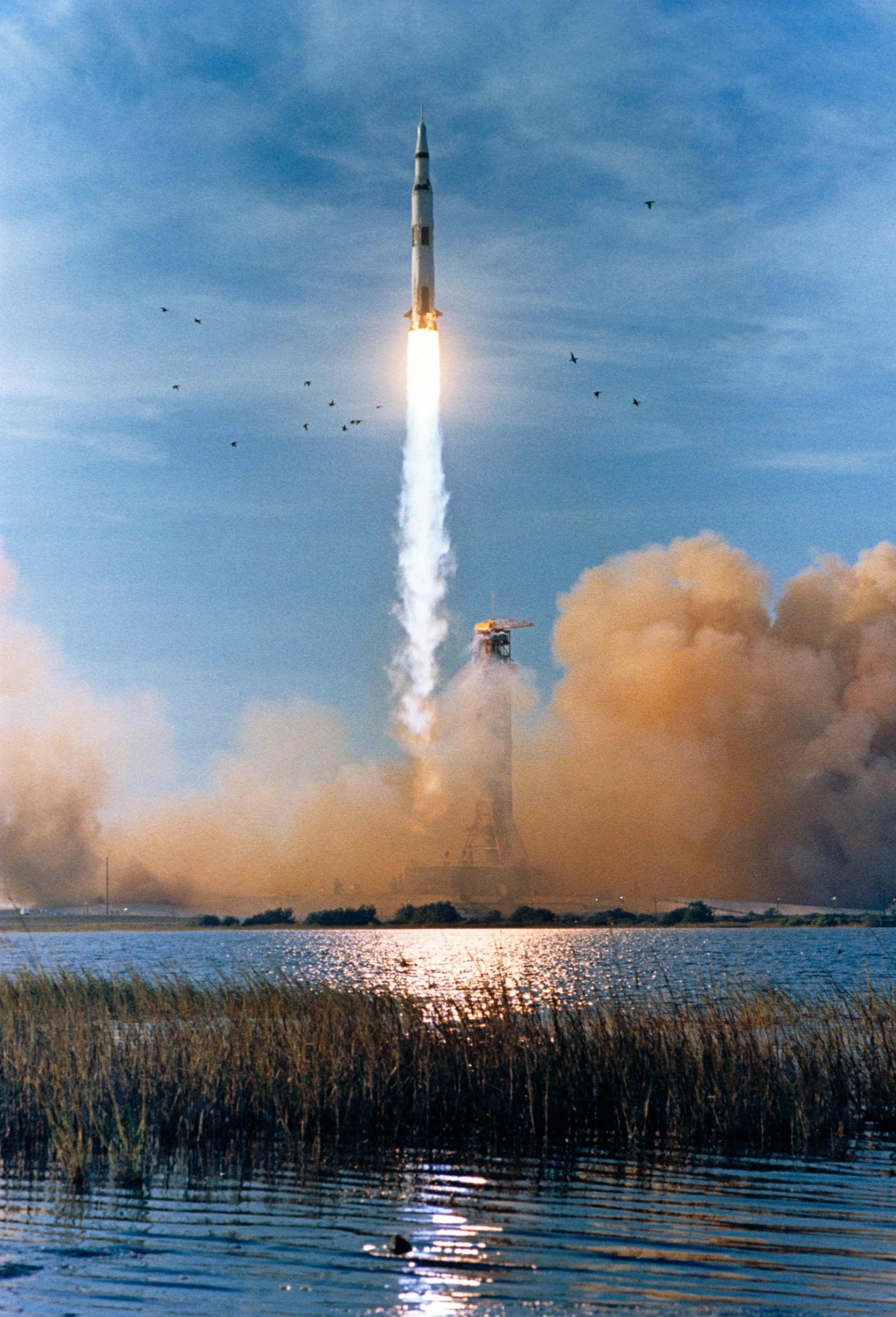 The Saturn V carrying Apollo 8 lifting off from Kennedy Space Center on December 21, 1968, seen across the water