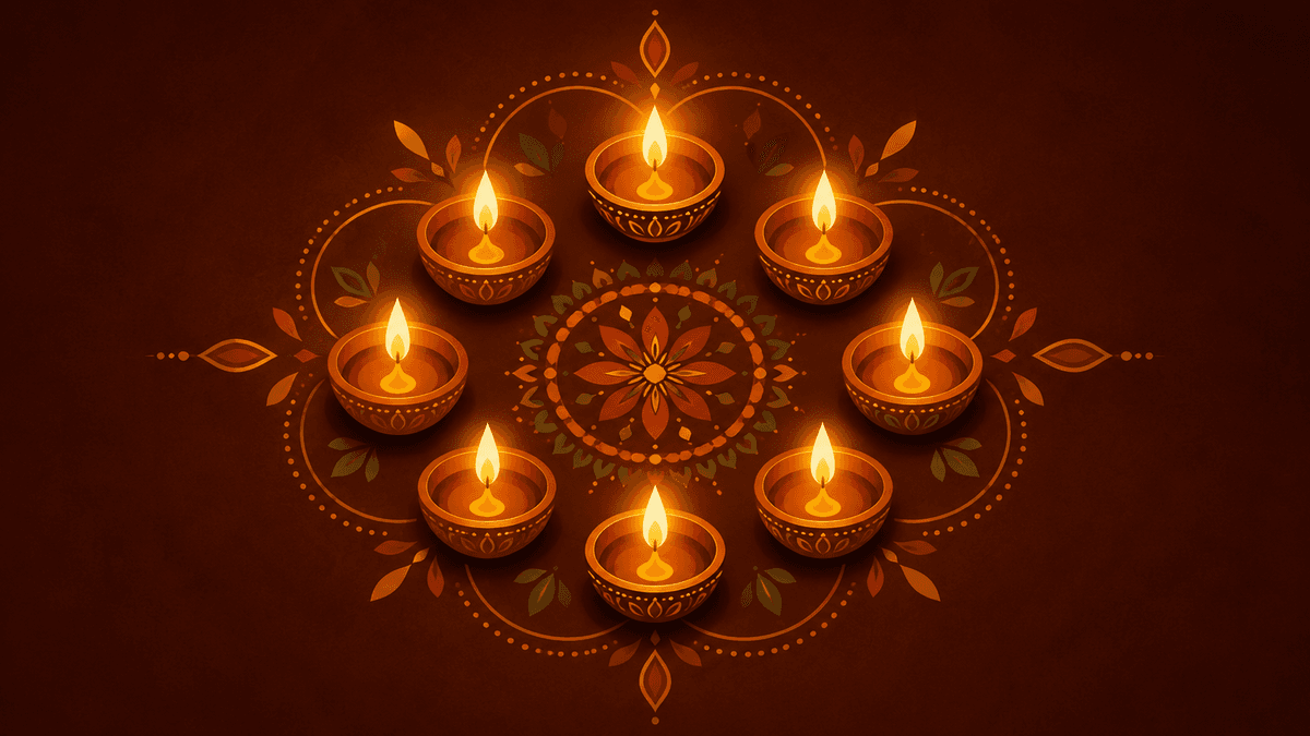Glowing oil lamps arranged around a floral rangoli pattern.